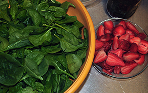 Fresh spinach and strawberries