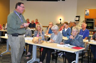 Horticulture agent Dennis Patton instructs EMG trainees during a classroom training session