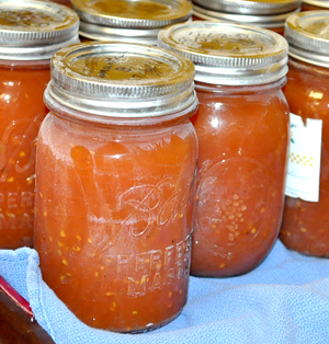 Jars of home canned tomato sauce