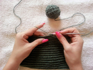 Pair of hands knitting