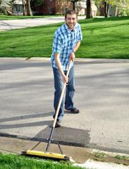 Sweep grass clippings out of gutters