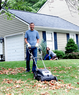 Mulch mowing leaves into the yard