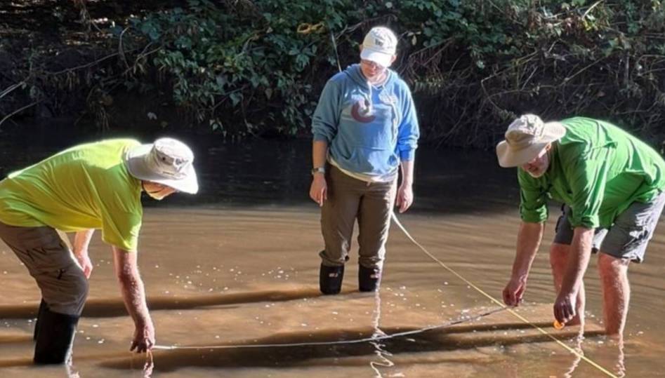 Extension Master Naturalists test water quality